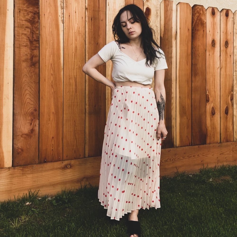 Pink polka dot skirt.